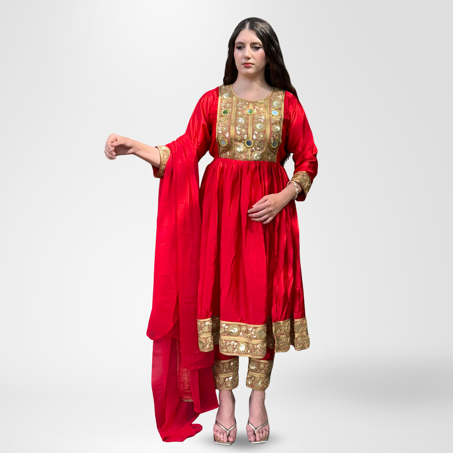 Woman wearing a red and gold traditional outfit, Gul-e-laal.