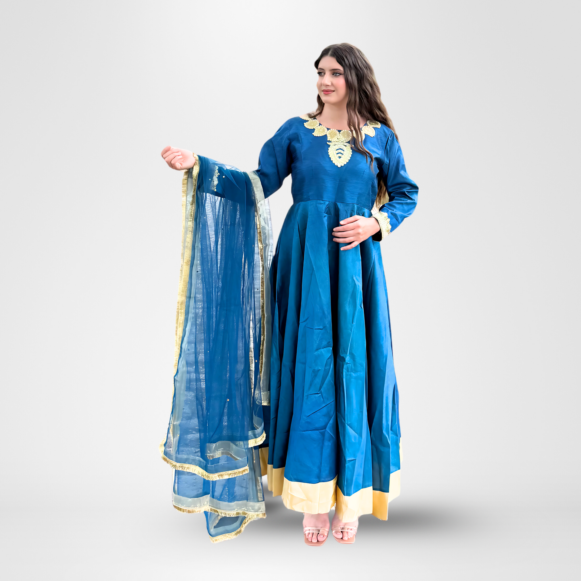 Woman wearing a blue traditional outfit with a matching dupatta, Neelam.